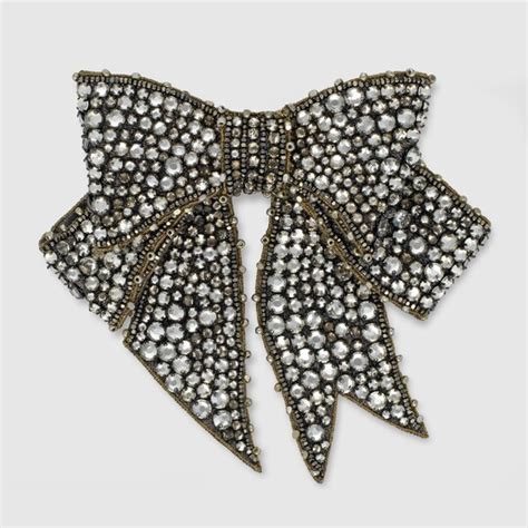 gucci bow brooch outfit|gucci pins.